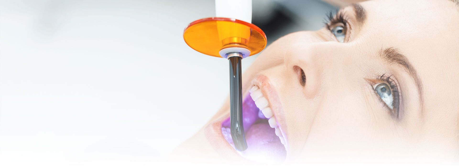 Woman having laser treatment at the creastwood dental group